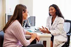 Patient talking to doctor